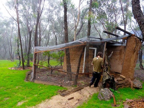 Cade working on the floor of the Chook Palace