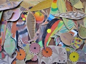 Colourful hand-decorated leaves celebrate the resilience of Country and community regeneration following Blue Mountains bushfires.