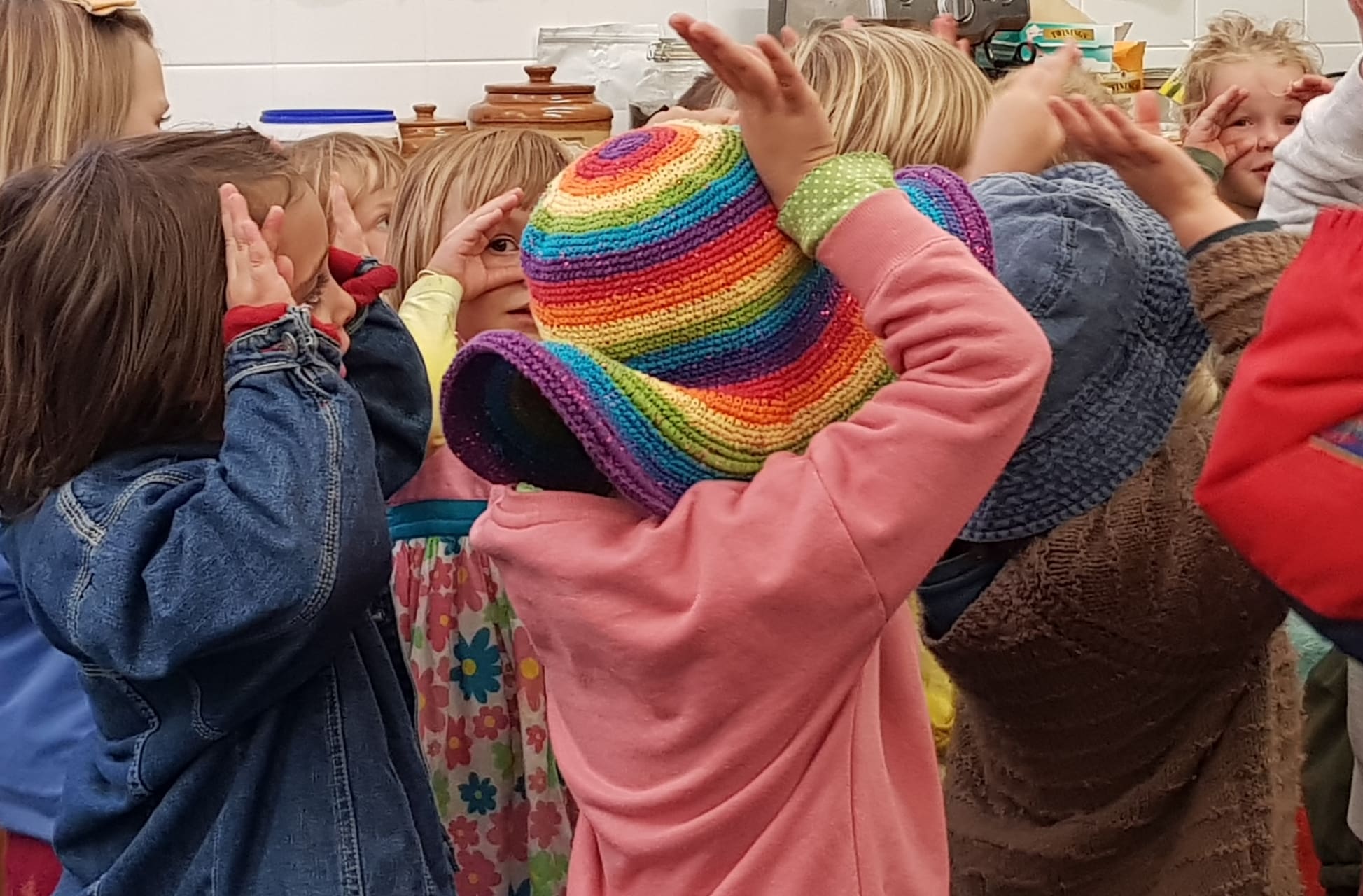 Kindy children at Kindlehill weave a harmonious web of belonging through shared rhythm, fostering compassion and deep connection.