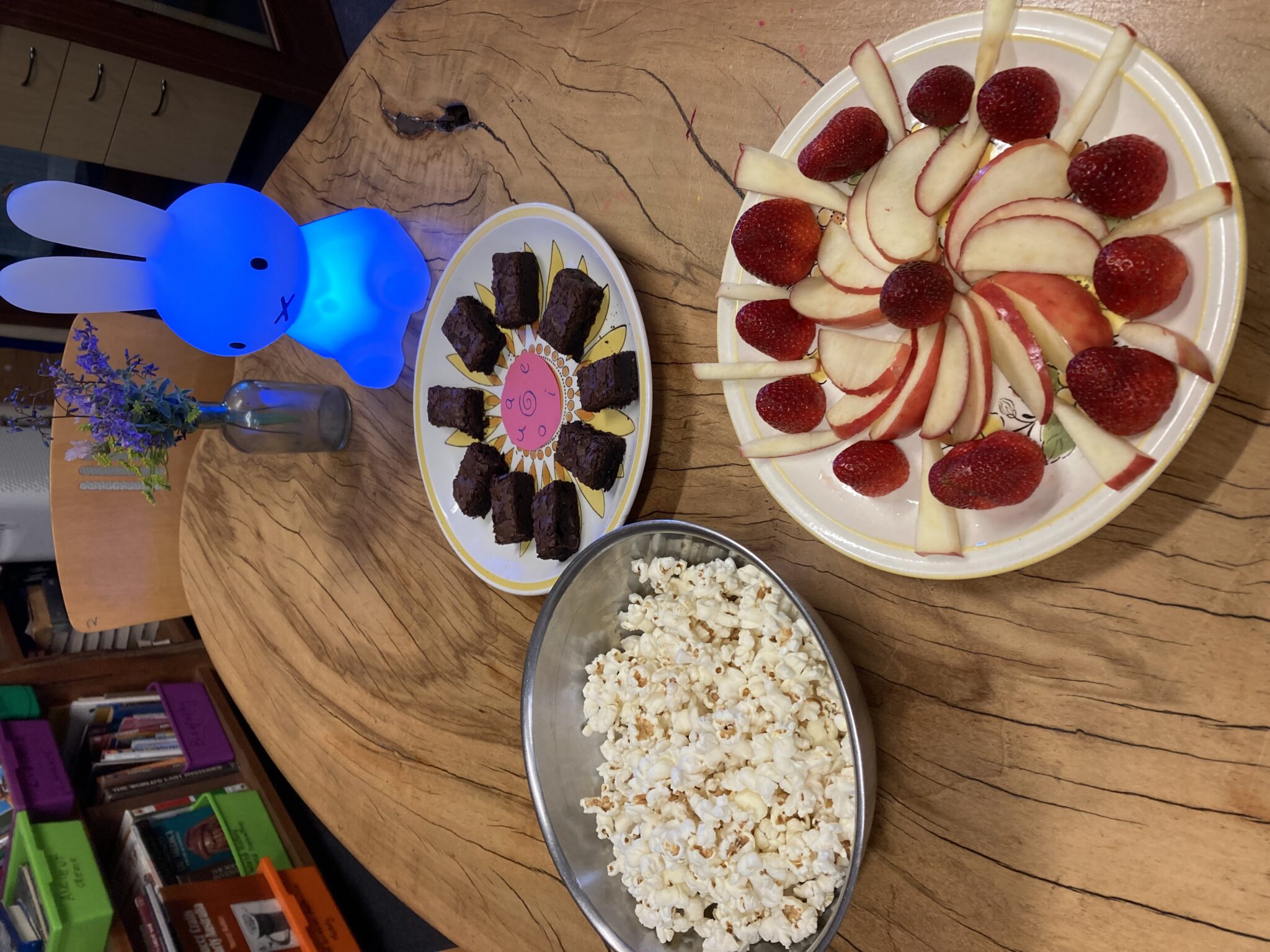 Nourishing platters on a timber table celebrate Kindlehill students perseverance and success in their literacy journey.
