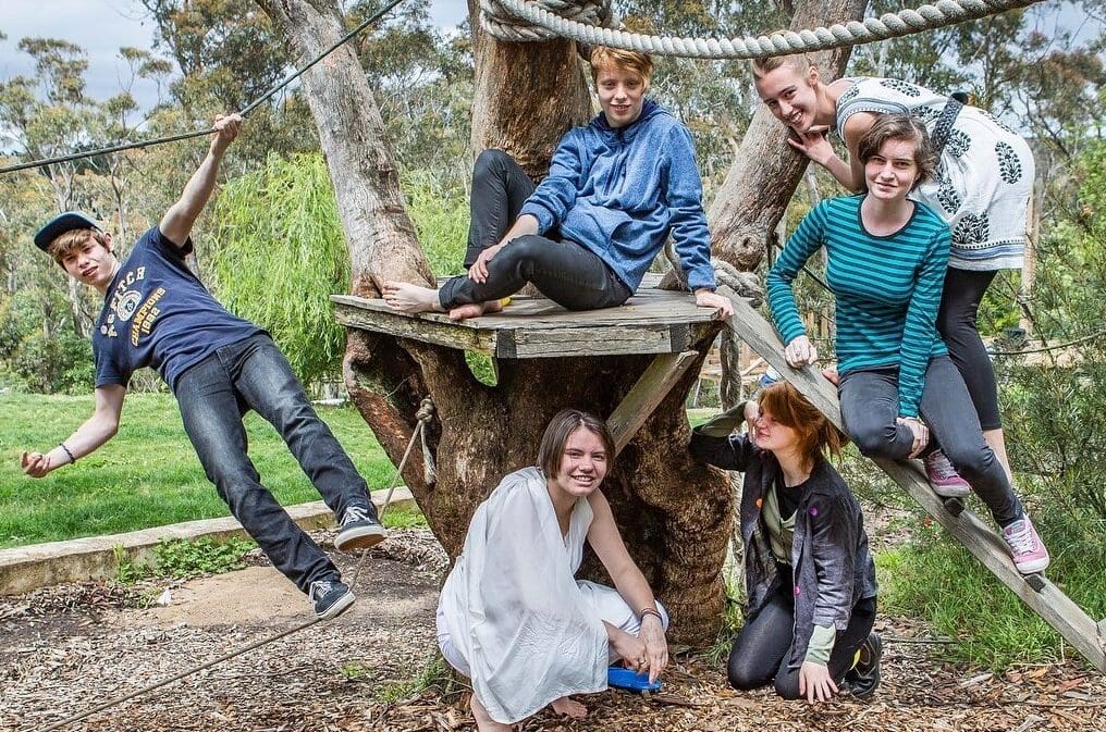 Students foster community belonging and resilience through nature-based play in the wild Blue Mountains bushland.