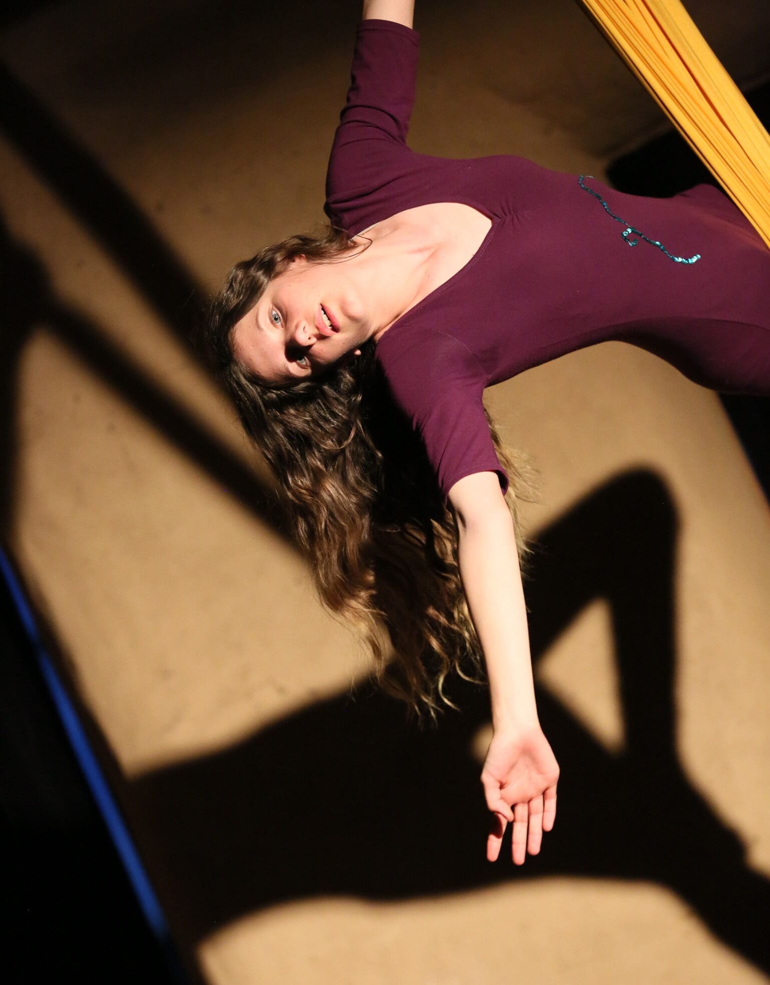 A Kindlehill student cultivates inner strength and creative beauty through graceful aerial movement and artistic storytelling.