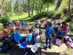 Students gather in a bushland circle, building community and connecting with the natural rhythm of the Blue Mountains.