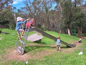 Children foster resilience and deep connection to land through adventurous play amongst the local Blue Mountains bushland.