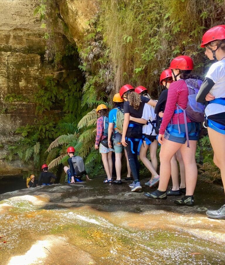Kindlehill students build resilience and connection to Country while canyoning in the rugged wildness of the Blue Mountains.