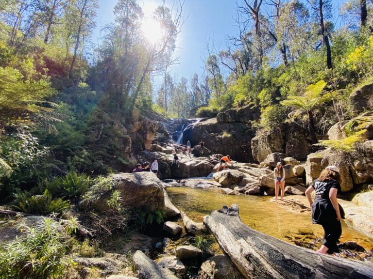 Kindlehill students connect with Country and each other while exploring a waterfall in the Blue Mountains bushland.