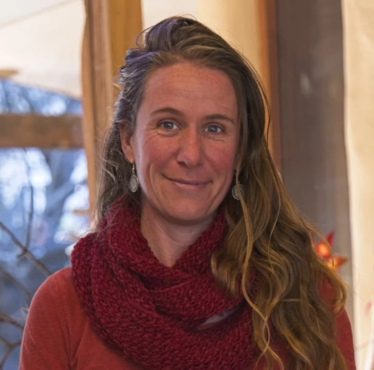 Kindlehill educator radiates the heart-led community spirit central to building the schools organic performance space and nurturing children.