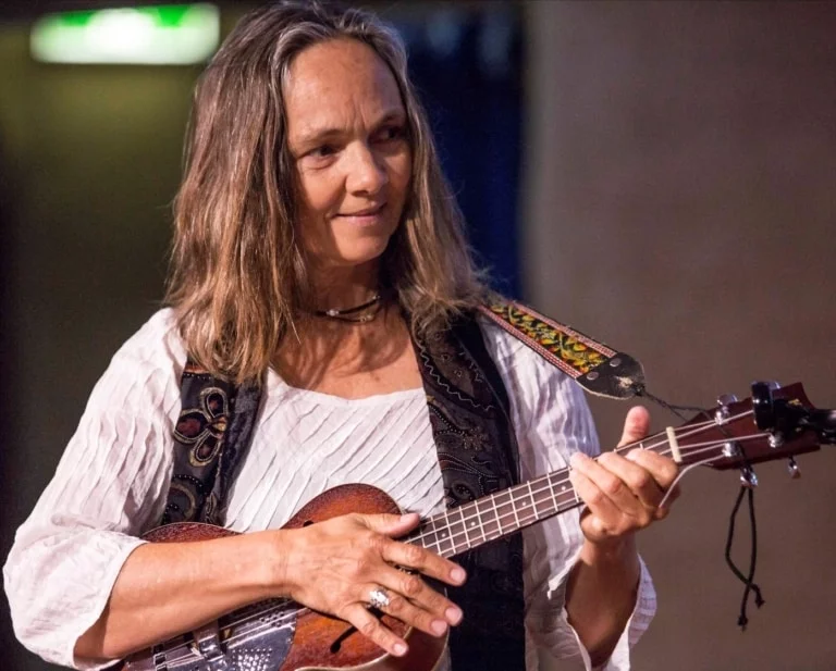 Kindlehill community member plays music, fostering deep connection and celebrating the schools heart-centred spirit through song.