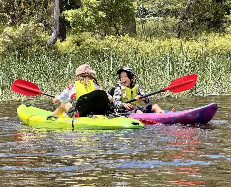 Kindlehill students cultivate resilience and connection through joyful outdoor learning on their cherished local lake.
